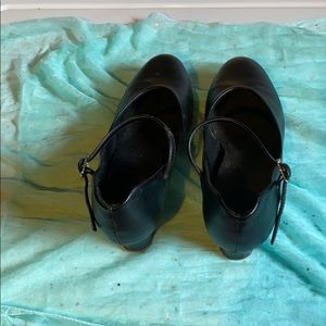 Black dress shoe.